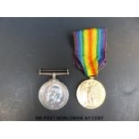 A WWI medal pair awarded to 186040 GNR E. Rose R.