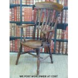 A 19thC elm seated Windsor chair