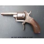 Six shot hammer action pin fire revolver with wooden grips, folding trigger and 2.