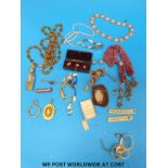 A collection of jewellery to include a white metal necklace, a cut steel miser purse,