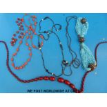 A collection of necklaces to include beaded coral, carnelian agate, bakelite beaded,