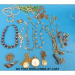 A collection of costume jewellery to include glass beaded necklaces,