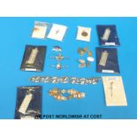 A collection of 9ct gold and silver bar brooches,