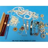 A collection of costume jewellery to include a three strand pearl necklace, watches,