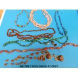 A collection of necklaces to include six strand coral necklace, lapis lazuli,