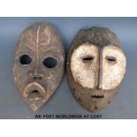 Two African tribal masks (largest 25cm)
