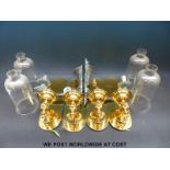 A set of four brass wall light fittings,