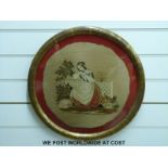 Two framed circular embroideries, late 19thC, one of a lady on a stone bench with bird,