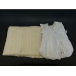 A c1914 christening gown and a finely knitted baby's blanket