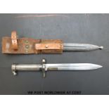 A Swedish bayonet with metal cross-cut grip handle,