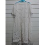 A quantity of Victorian and early 20thC clothing to include christening gowns, children's dresses,