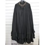 A collection of Victorian / Edwardian ladies clothing including black taffeta skirt, blouses,