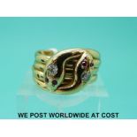 An 18ct gold ring in the form of two snakes entwined set with diamonds and rubies with Chester 1900