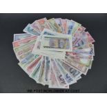 Fourteen sets of specimen banknotes from around the world, issued by the Franklin Mint,