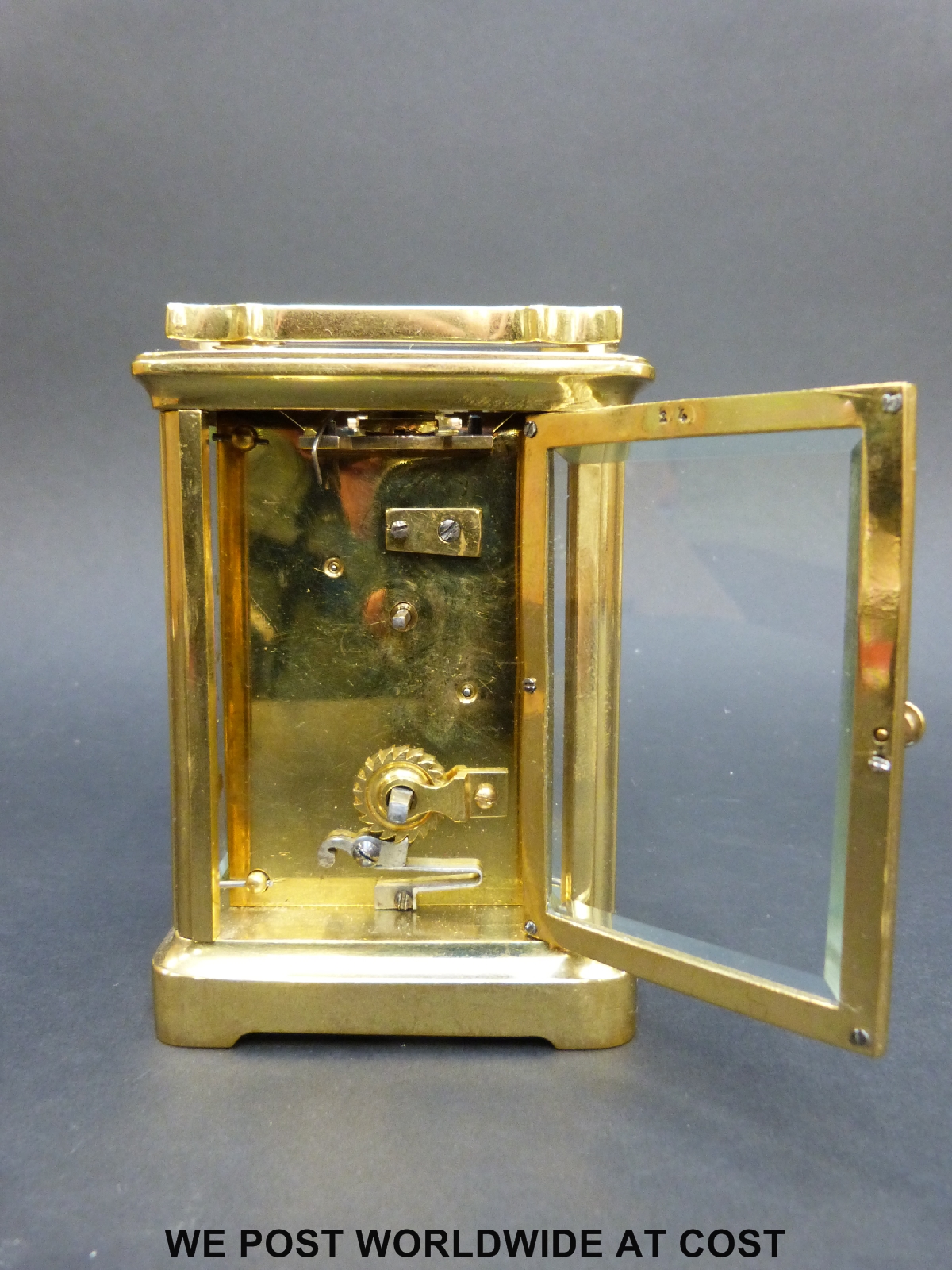 A brass carriage clock in corniche style case, with white enamelled dial, - Image 6 of 7