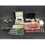 A quantity of plated cutlery including multiple cased examples, fish servers, novelty Walker & Hall,