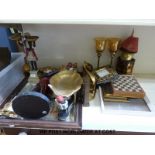 A quantity of decorative items to include photo frames, large candle holders, blackamore figures,