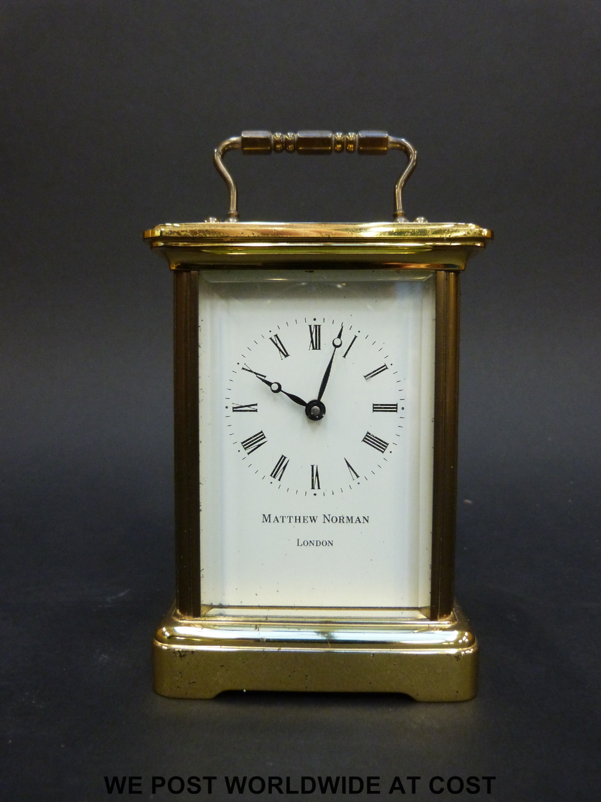 Matthew Norman to dial brass carriage clock in corniche style case,