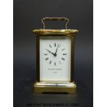 Matthew Norman to dial brass carriage clock in corniche style case,