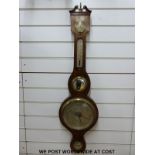 A late 19thC oak cased barometer the main silvered dial 20cm diameter, case in built thermometer ,