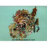 A collection of costume jewellery to include watches, brooches,