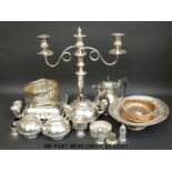 An Elkington silver plate four-piece tea set, swing handled dish, candelabra,