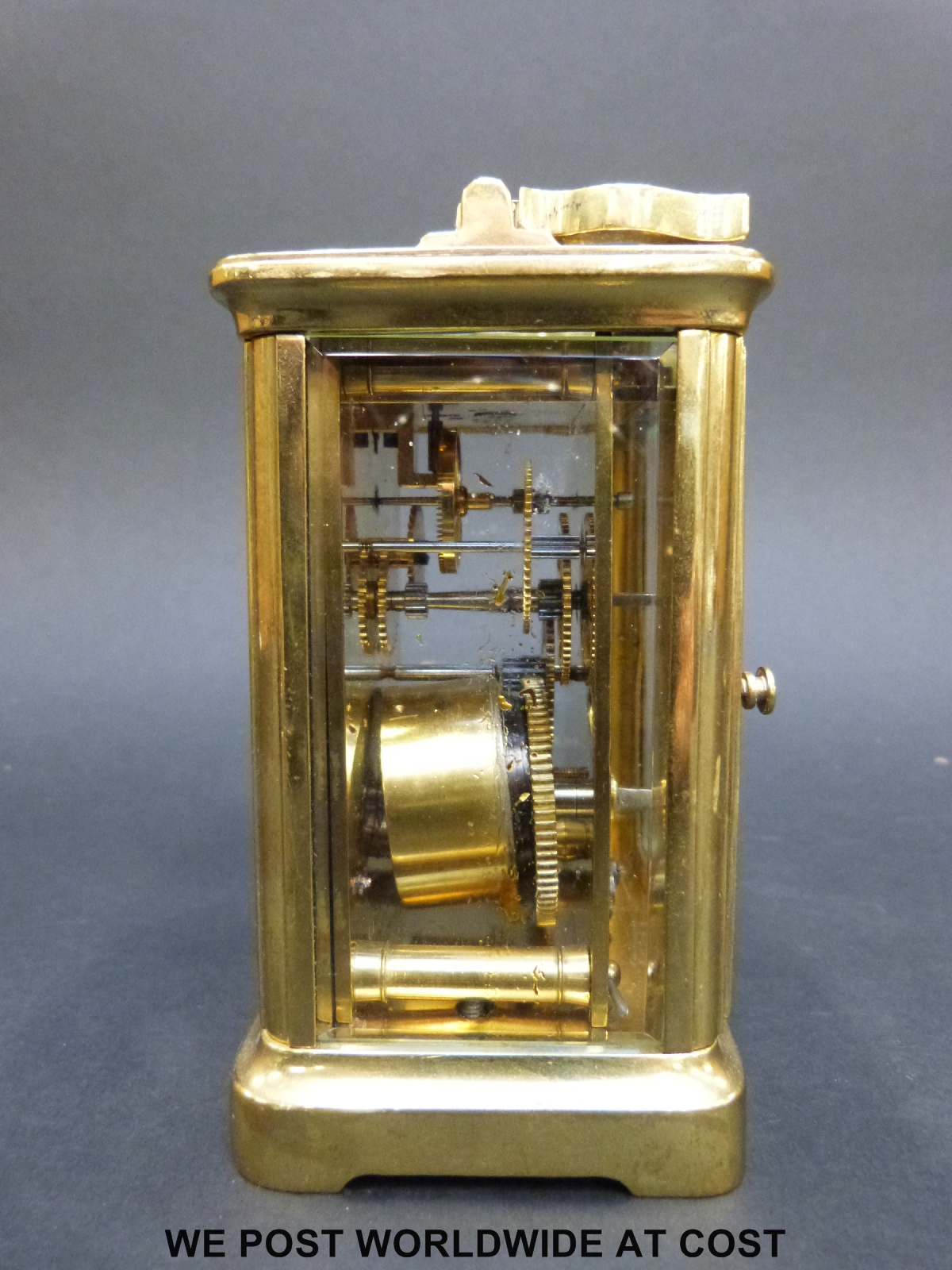 A brass carriage clock in corniche style case, with white enamelled dial, - Image 5 of 7