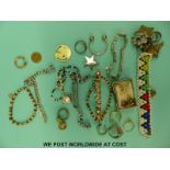 A collection of costume jewellery to include earrings, rings,