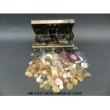 A metal coin box containing sundry coinage from Victoria onwards,