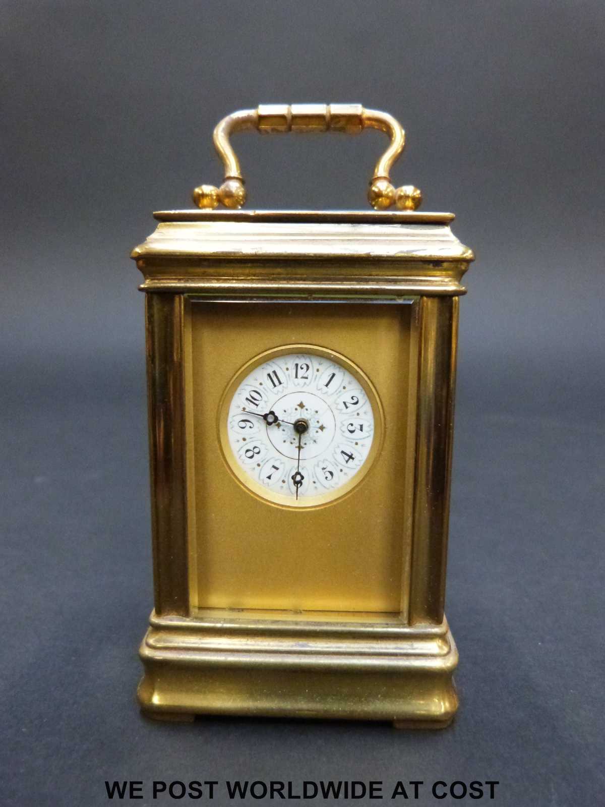 A brass cased miniature carriage clock in corniche style case with inset circular decorated - Image 8 of 9