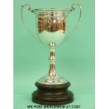A large George V hallmarked silver twin handled trophy cup, Birmingham 1926 maker Adie Brothers,