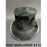 A small top hat by Harman & Son Hatters,