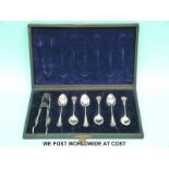 A boxed set of six Victorian silver teaspoons and matching tongs, Birmingham 1886,