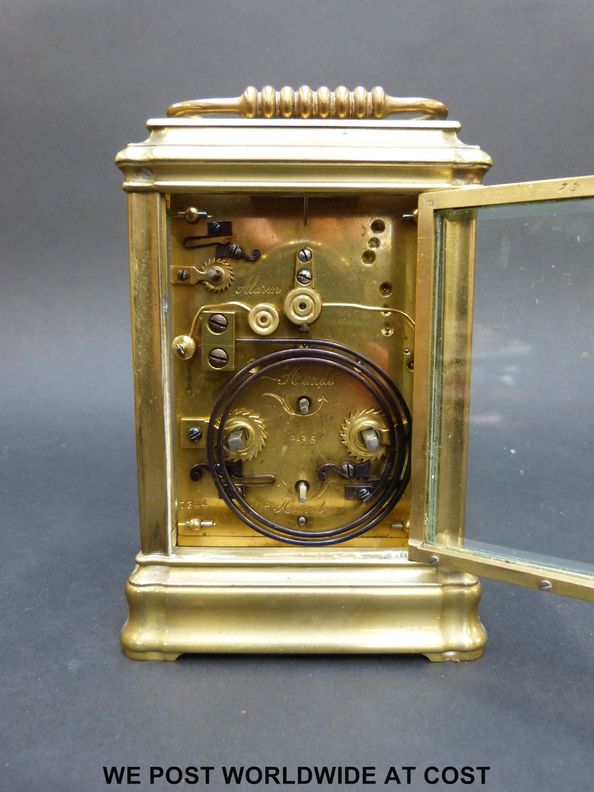 A late 19th / early 20th century brass carriage clock with repeat hourly mechanism striking on a - Image 4 of 7