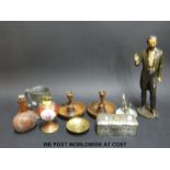 A pewter mug, window dressing model, candle stick,