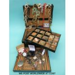 A large jewellery box containing a quantity of jewellery including 9ct gold earrings, silver,