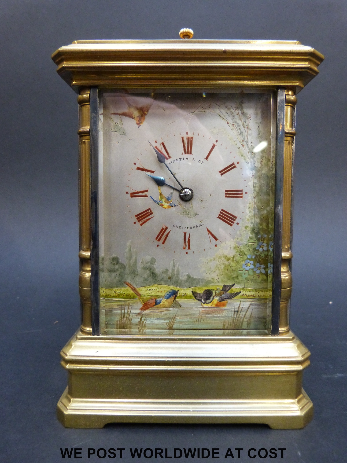 A late 19thC repeating carriage clock with hand-painted dial and sides behind bevelled glass