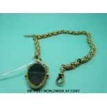 A 9ct gold Albert made up of faceted oval links and a 9ct gold swivel fob set with agate and