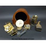 A box of clock parts to include an empty case, gongs, pendulum,