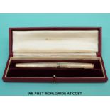 A 9ct gold Parker fountain pen uninked in original case and box marked Presidential Single