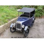 Austin 7 junior battery operated child's car with retractable hood, lights and spare wheel,