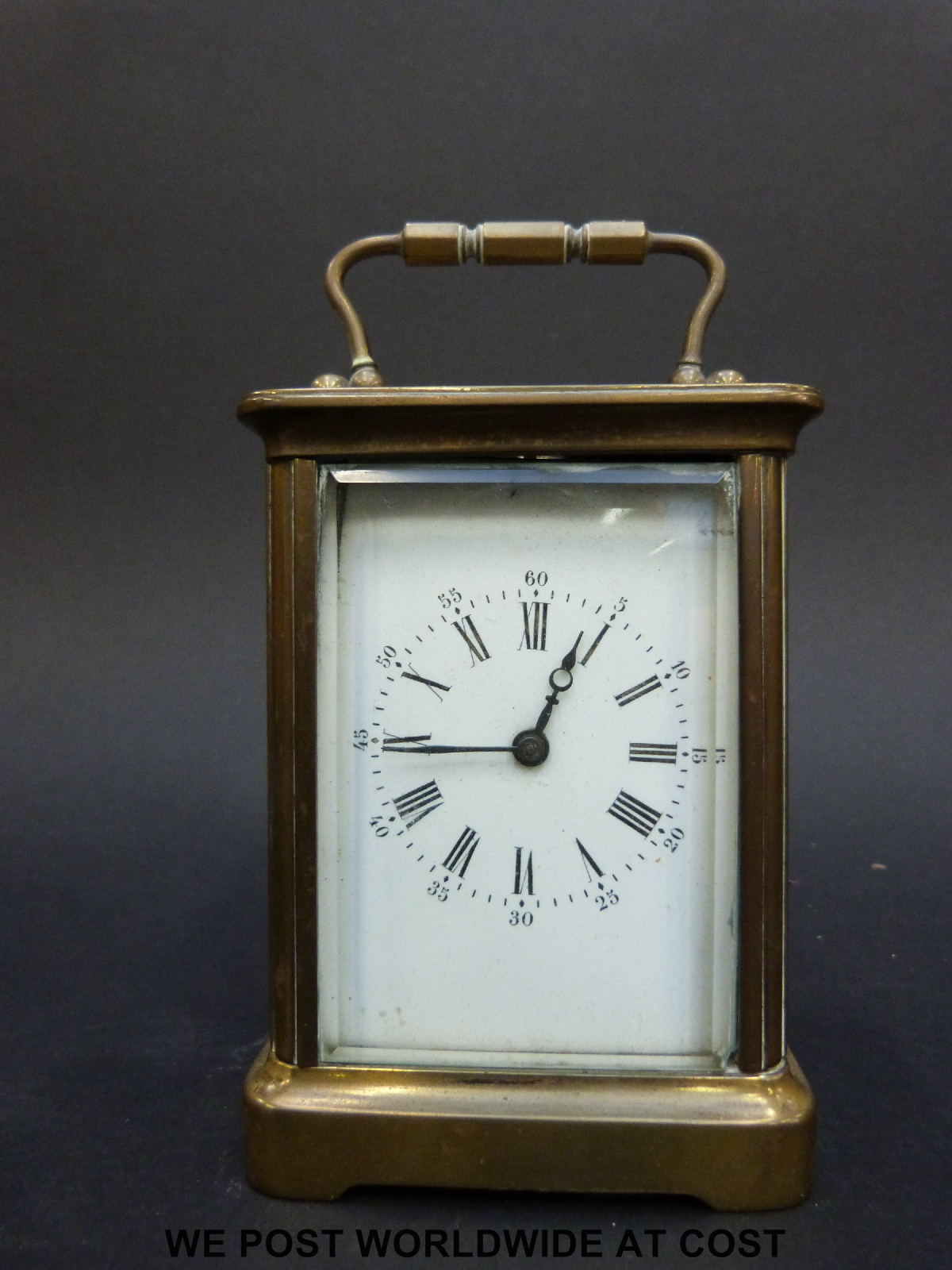 A brass carriage clock in corniche style case no.