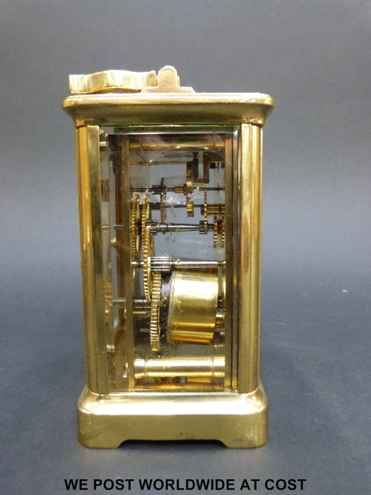 A brass carriage clock in corniche style case, with white enamelled dial, - Image 3 of 7