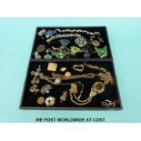 A quantity of costume jewellery to include a large cameo set necklace, Trifari brooch,
