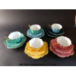 A harlequin set of Royal Stuart tea cups,