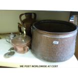 A large copper log bin,