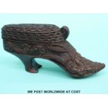 A possibly Scandinavian intricately carved snuff mull in the form of a shoe (6cm tall,