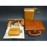 A crocodile skin jewellery box and two gentleman's cased flask sets