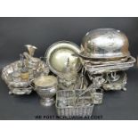A collection of plated ware including Sheffield plate serving dishes, cruets etc.
