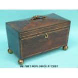 A William IV rosewood and brass inlaid tea caddy with two covered compartments flanking a glass